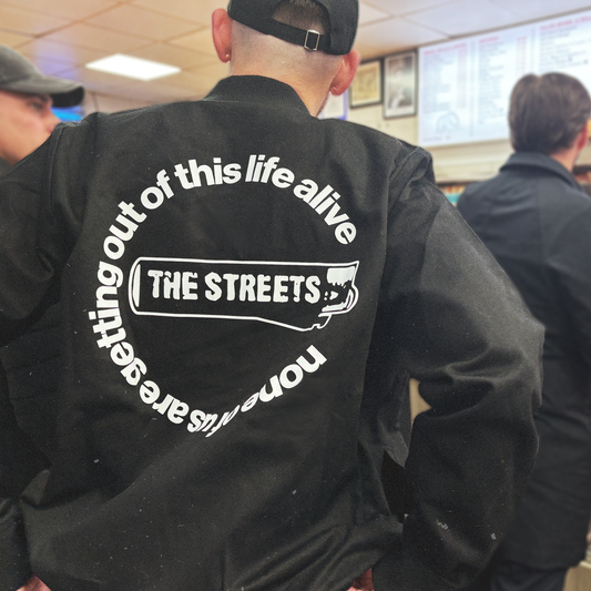 Black None Of Us Are Getting Out Alive Bomber Jacket